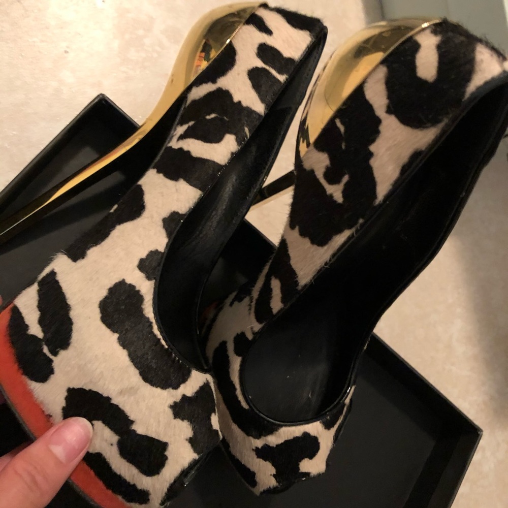 Giuseppe Zanotti heel/$25